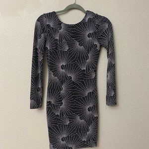 Black mini dress with a deep V in the back